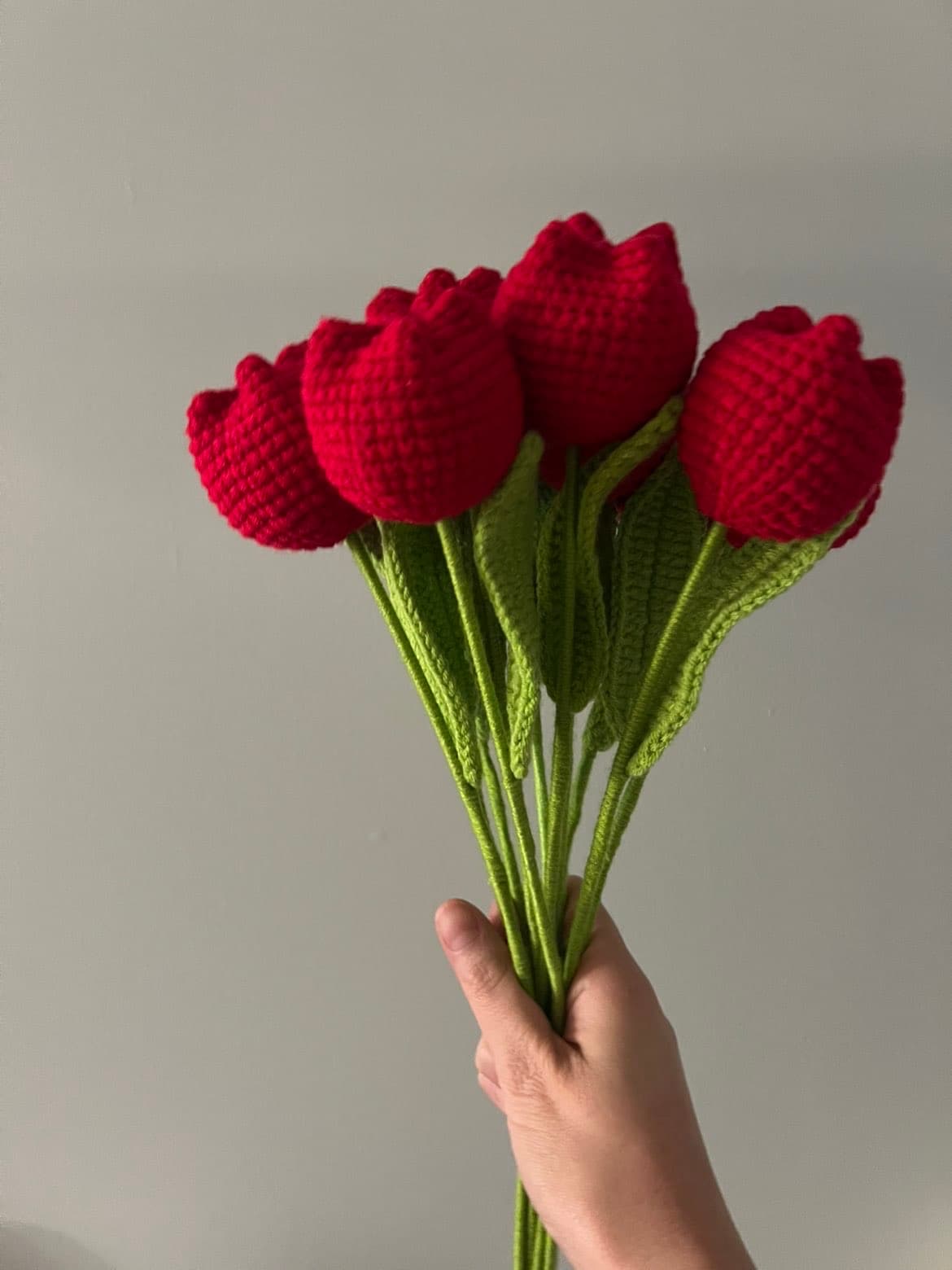 Red crochet tulip bouquet display